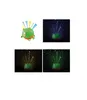 A collage of images showing a green, round, monster-like night light projector with fiber optic strands emitting light in different colors. Produktbild-Vorschau