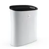 A studio shot of a white and black air purifier against a white background. Podgląd zdjęcia produktu
