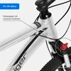 Close-up of a bicycle's front fork and frame, highlighting a lockout function. Produktbild-Vorschau