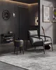 A modern living room or entryway with a shoe bench, armchair, and guitar. Produktbild-Vorschau