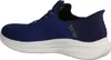 Side view of a blue Skechers slip-on sneaker with a white sole. Voir les images du produit