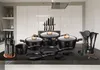 A collection of cookware and kitchen utensils displayed on a countertop in a modern kitchen. Náhled obrázku produktu
