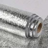 A roll of silver foil with a textured pattern. Produktbild-Vorschau