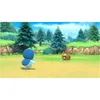 A video game scene with two Pokémon characters in a grassy, wooded area. Produktbild-Vorschau