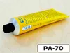 A tube of Tormek PA-70 polishing paste on a wooden surface. Náhľad obrázku produktu