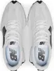 A top-down view of a pair of white New Balance sneakers with black accents. Voir les images du produit