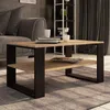 A coffee table in a living room setting with a sofa and bookshelf in the background. Voir les images du produit