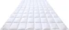 A white quilted duvet laid out flat on a white background. Náhled obrázku produktu