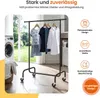 A clothing rack with clothes hanging on it, placed next to a washing machine in what appears to be a laundry room or closet. There are informational graphics on the right side of the image. Produktbild-Vorschau