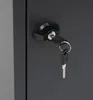 A close-up of a lock and key on a dark gray surface. Anteprima dell’immagine prodotto