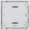 The back of a white wall thermostat with mounting holes and text indicating the material. Produktbild-Vorschau