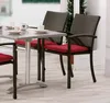 Outdoor cafe setting with a table and chairs. Produktbild-Vorschau