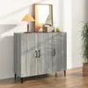 A gray wooden sideboard with three doors is shown in a room with a lamp and a plant. Produktbild-Vorschau