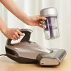 A person is holding a detachable dustbin from a vacuum cleaner. Náhled obrázku produktu