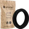 A product shot of a black textile cable next to its packaging. Produktbild-Vorschau
