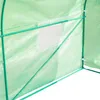 Close-up view of a green greenhouse structure with a transparent window. Voir les images du produit
