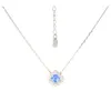 A silver necklace with a blue pendant and clear crystals, displayed on a white background. Produktbild-Vorschau
