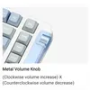 Close-up of a mechanical keyboard with a focus on the volume knob and some keys. Produktbild-Vorschau