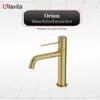 A gold-colored faucet is shown against a grid-patterned background. Produktbild-Vorschau