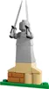 A LEGO statue with two swords raised. Produktbild-Vorschau