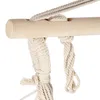 Close-up of ropes and a wooden bar, likely part of a hanging chair or hammock. Podgląd zdjęcia produktu