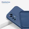 A close-up view of a blue phone case, showing the camera cutout and the interior lining. Produktbild-Vorschau