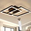 A modern black ceiling lamp with white LED lights, shown on a ceiling with a remote control and Wi-Fi symbol overlay. Náhľad obrázku produktu