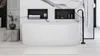 A modern bathroom with a freestanding bathtub, marble walls, and black fixtures. Anteprima dell’immagine prodotto