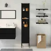 A modern bathroom with a black vanity, sink, mirror, and a tall black storage cabinet. Anteprima dell’immagine prodotto