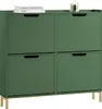 A dark green shoe cabinet with four flip-down doors and gold legs, placed on a white background. Two books and a small candle are on top of the cabinet. Náhľad obrázku produktu