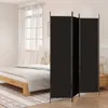 A bedroom scene with a bed and a room divider. Voir les images du produit