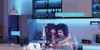 A couple embracing in a kitchen with blue LED lighting. Anteprima dell’immagine prodotto