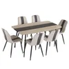 A dining table with six chairs arranged around it, presented on a white background. Produktbild-Vorschau