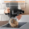 A person is emptying the dustbin of a vacuum cleaner into a trash bin. Voir les images du produit
