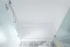 A top-down view of a white shower tray with frosted glass shower doors on either side. Produktbild-Vorschau