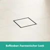 A close-up view of a floor drain with tiles. Produktbild-Vorschau