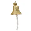 A brass bell with the words "TITANIC 1912" engraved on it, hanging from a white rope. Produktbild-Vorschau
