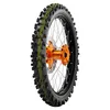 A close-up studio shot of a motocross tire mounted on a wheel rim. Náhľad obrázku produktu