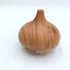 A wooden-patterned ultrasonic humidifier is shown against a white background. Podgląd zdjęcia produktu
