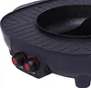 A close-up view of a black electric grill and hot pot with two red and black control knobs. Produktbild-Vorschau