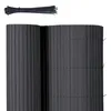 A roll of dark grey PVC privacy screen and a bundle of black zip ties against a white background. Podgląd zdjęcia produktu