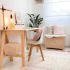 A cozy home office or study area with a wooden desk, chair, and storage. Anteprima dell’immagine prodotto