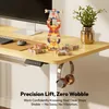 A desk with office supplies and decorative items. Produktbild-Vorschau