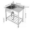 A stainless steel sink with a faucet and accessories, shown with dimensions indicated by text overlays. Náhled obrázku produktu