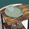 A close-up view of a rustic wooden bar cart shelf with a green tray and a glass vase. Produktbild-Vorschau
