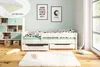 A child's bedroom with a white bed, a bookshelf, and decorative items. Produktbild-Vorschau