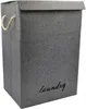 A gray laundry basket with a lid and rope handles. Produktbild-Vorschau