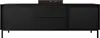 A black TV lowboard with fluted doors and drawers, with a small electronic device on top. Náhled obrázku produktu