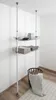 A two-tier adjustable shelving unit with wire baskets, a storage box, and a blanket in a laundry basket, set against a white wall and wooden floor. Produktbild-Vorschau