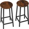 Two brown and black bar stools on a white background. Náhled obrázku produktu